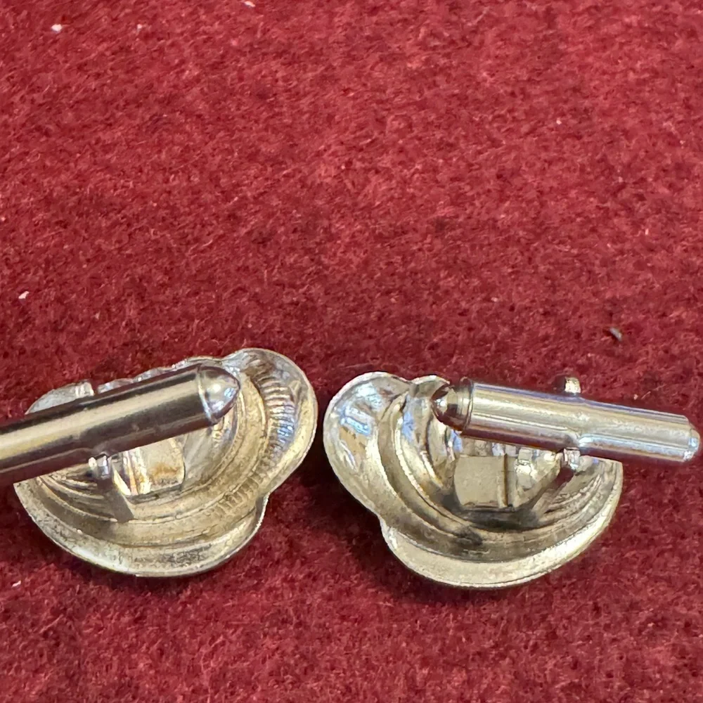 Men’s stamped sterling feather pillowy sea shell cufflinks